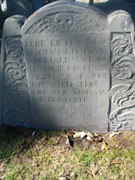 tombstone 1683 with winged skull design